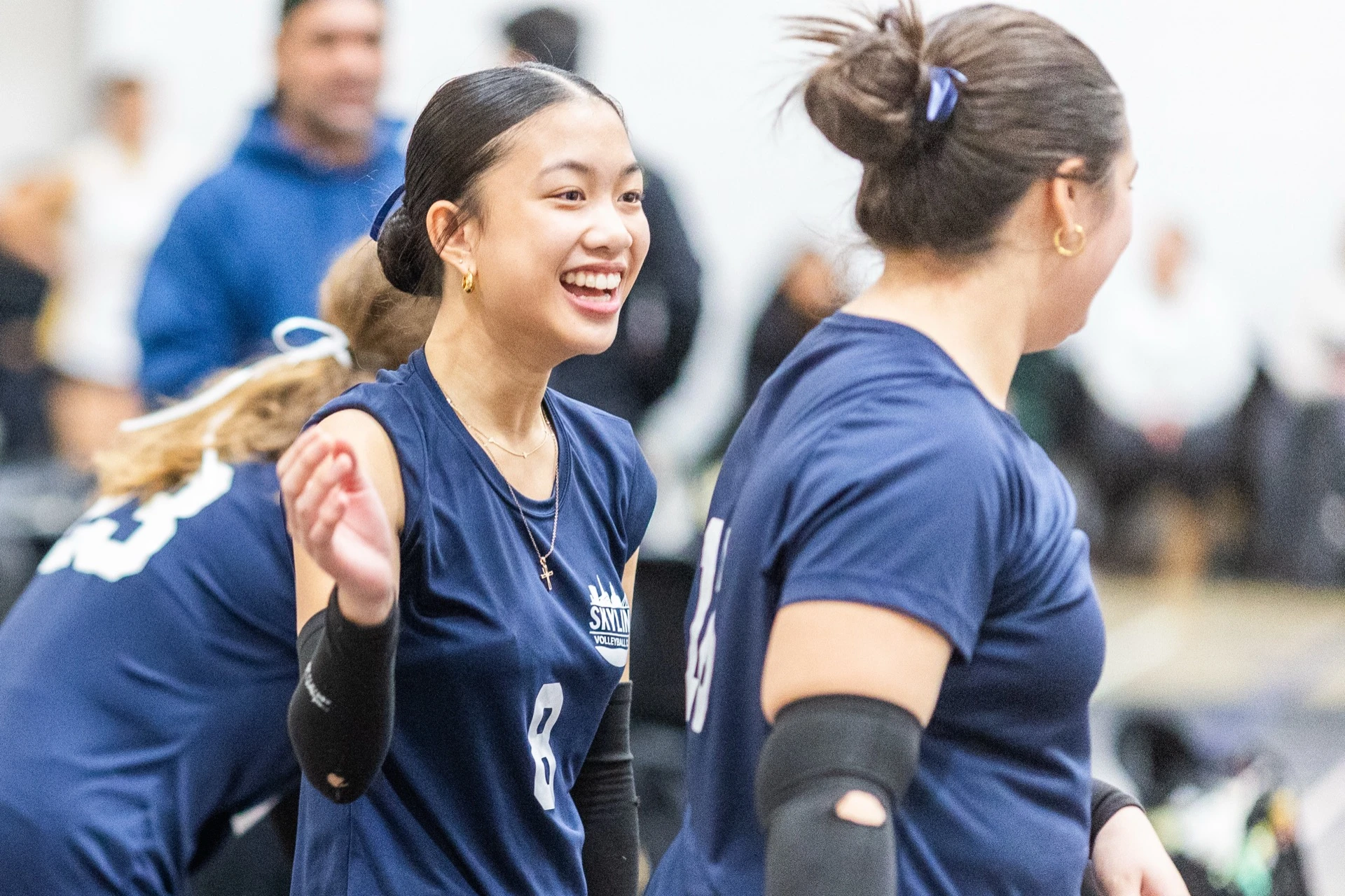 Sky Volleyball coach guiding athletes during a training session