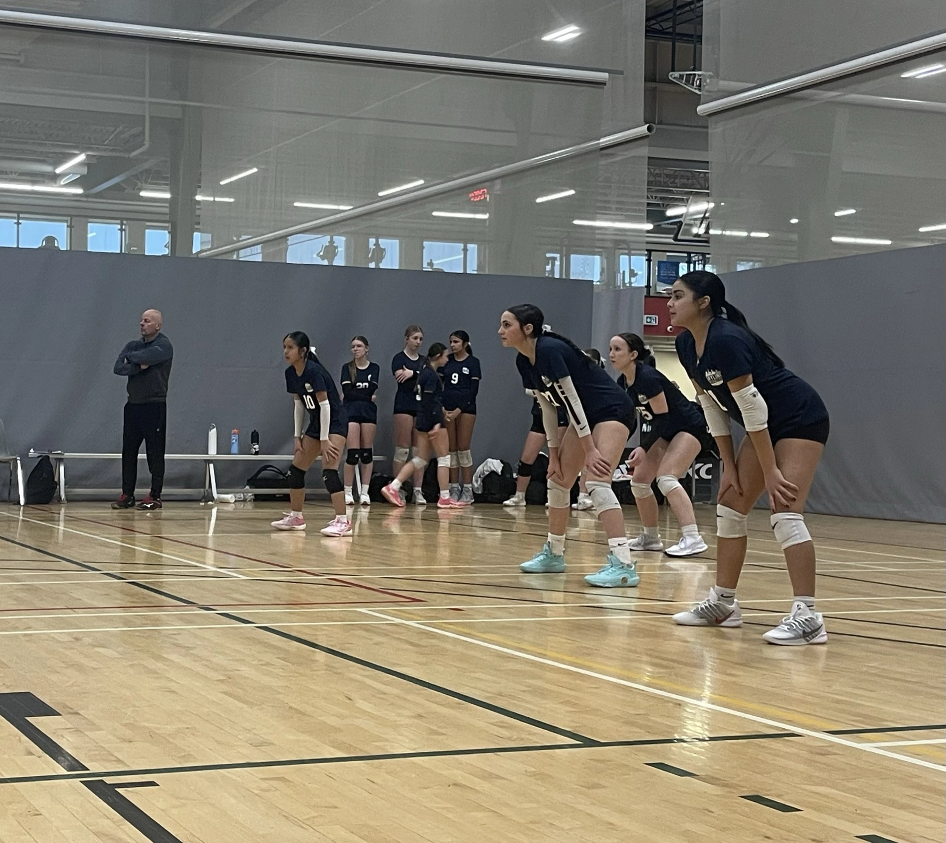 Volleyball athletes during competitive match play